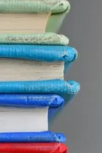 A stack of colourful books.