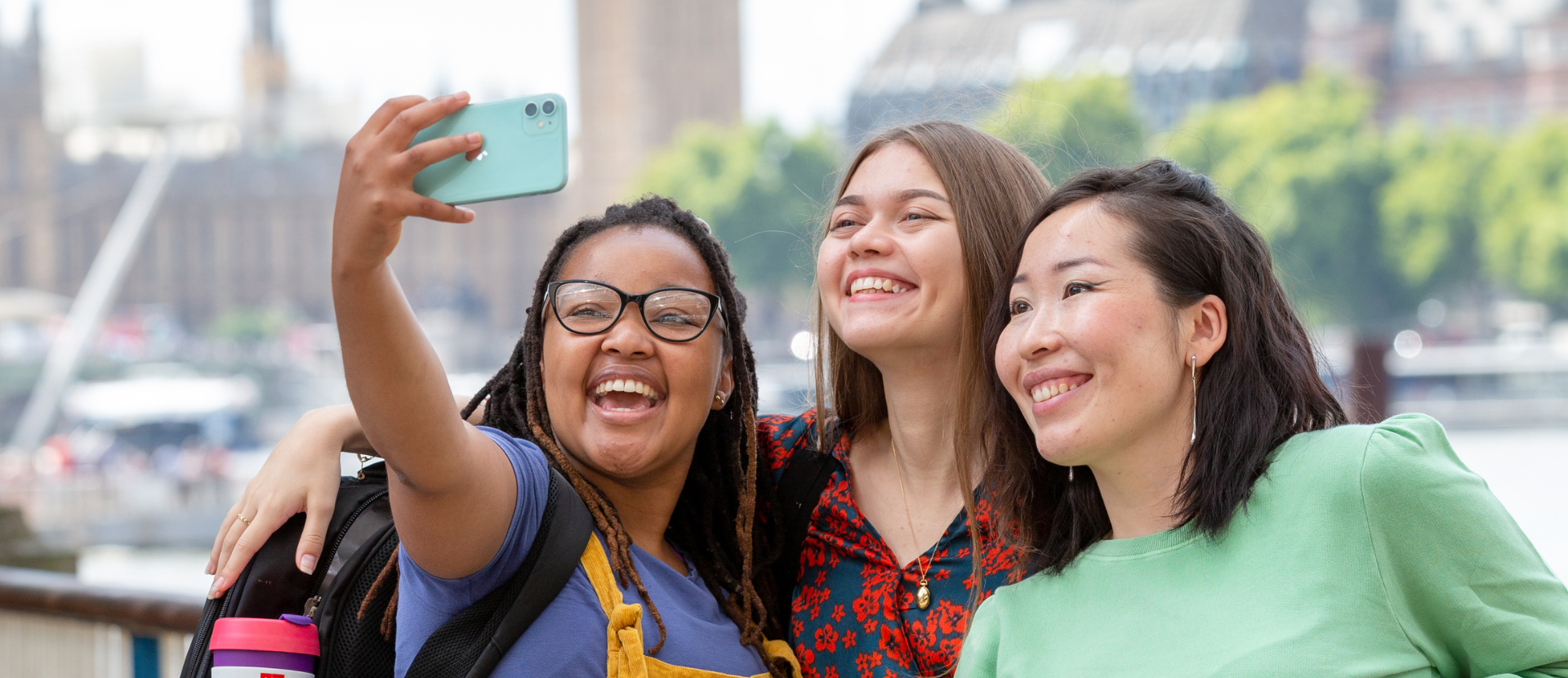 Three students taking a photo