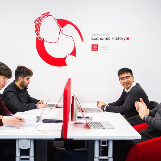 Group of students working at desks
