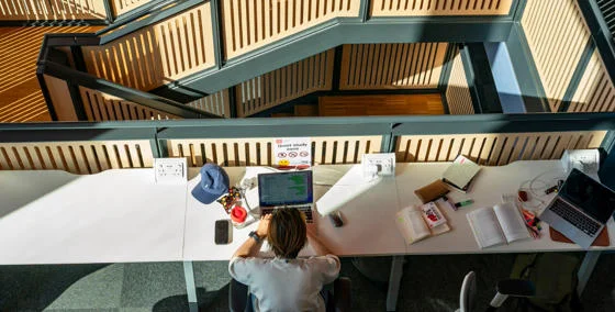 LSE Student studying in the Central Building