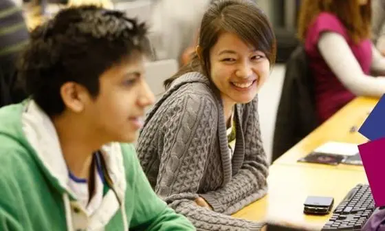 Smiling students in class