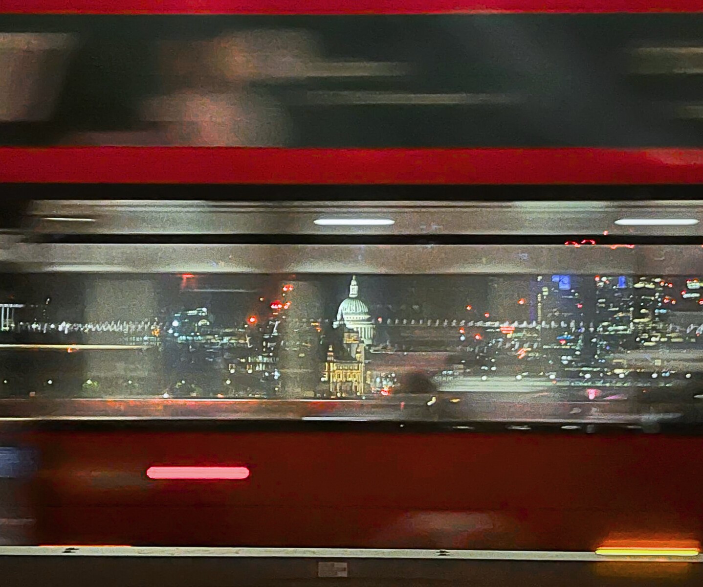 london skyline through bus window