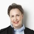 Woman with short hair in a suit