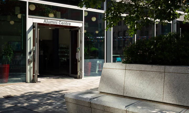 The exterior of the Alumni Centre in the sunshine