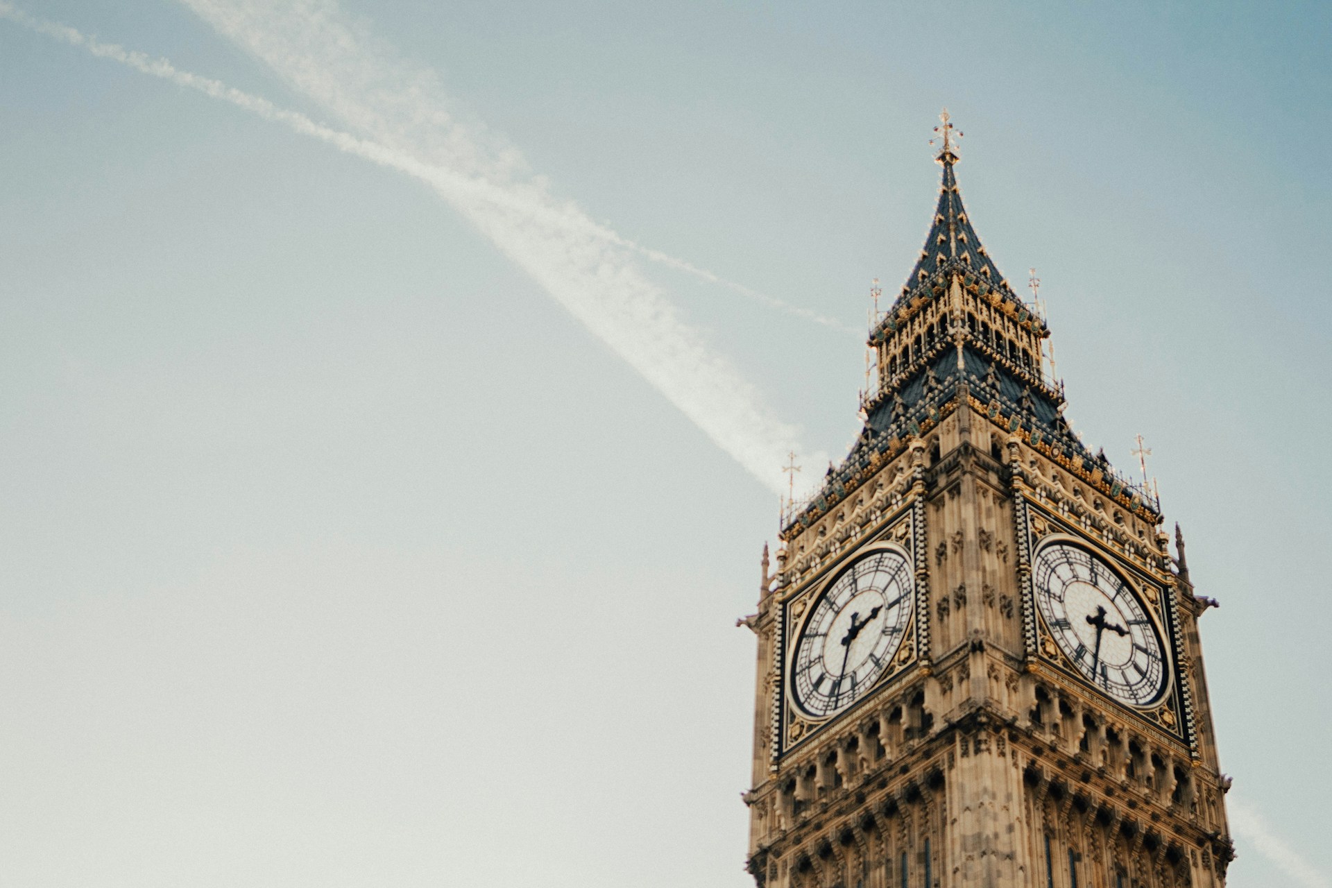 An image looking up from the Elizabeth Tower, at the face of Big Ben.