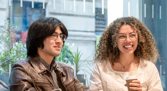 Three PBS students talking in the Centre Building