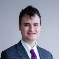 Headshot of Toby Edison