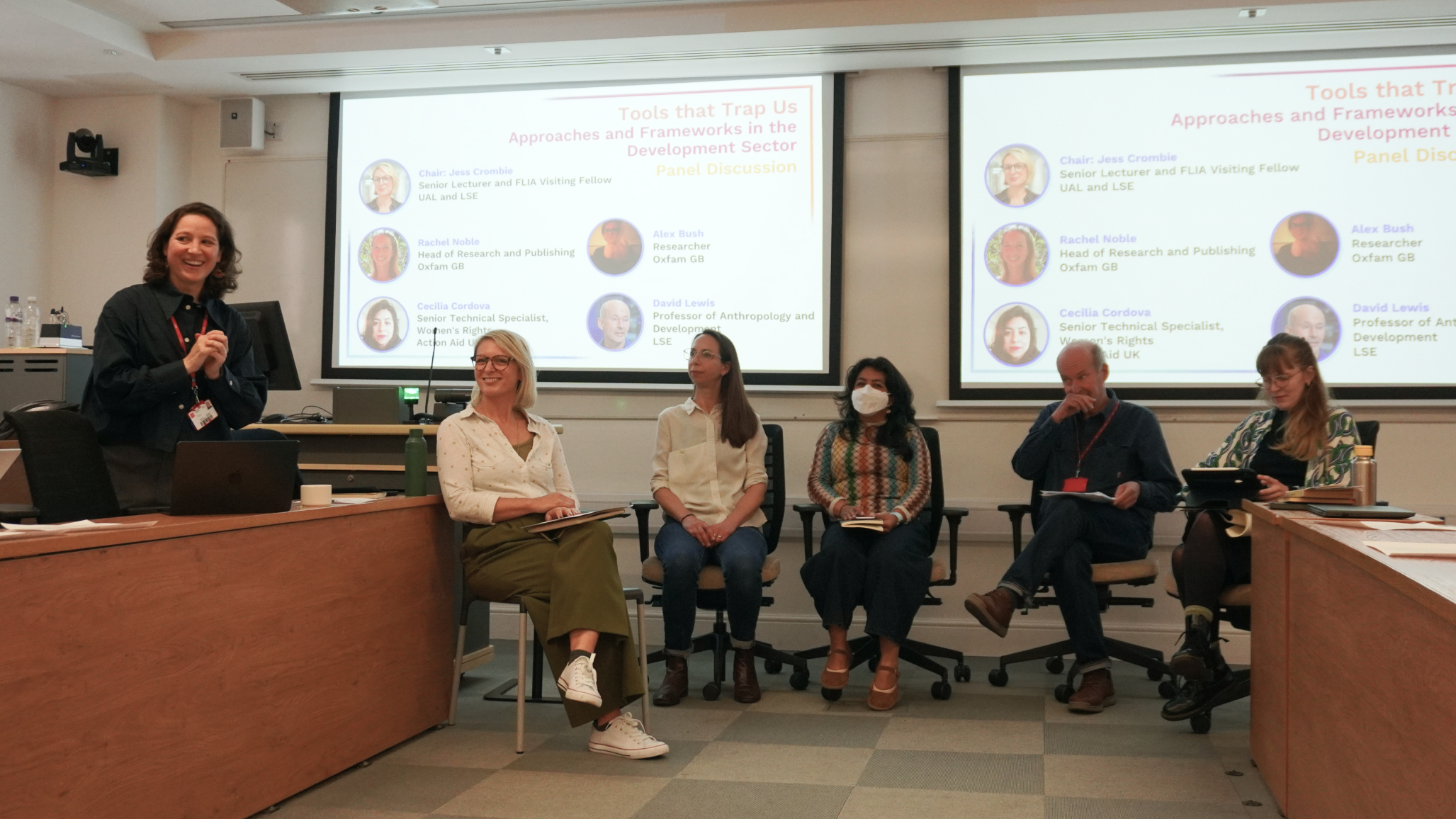 Workshop with five delegates and Dr Sophie Legros at the front of a lecture theatre.