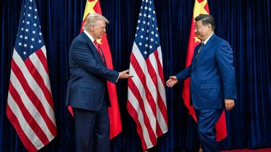 Donald Trump meets Xi Jinping with US and Chinese flags in the background