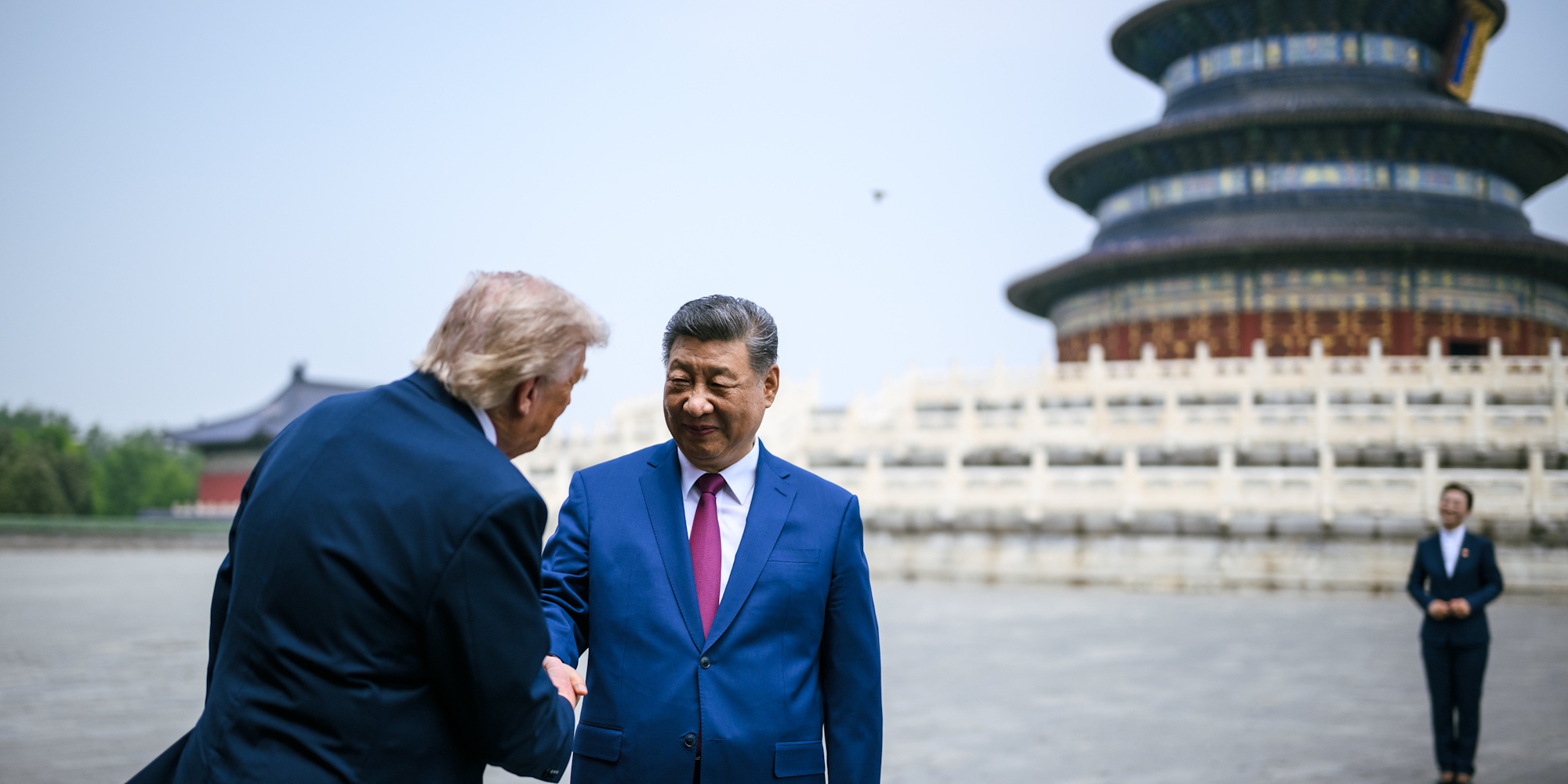 President Donald Trump and President Xi Jinping shaking hands