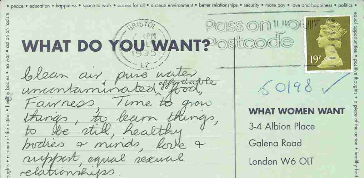 The back of a postcard with a stamp and writing.