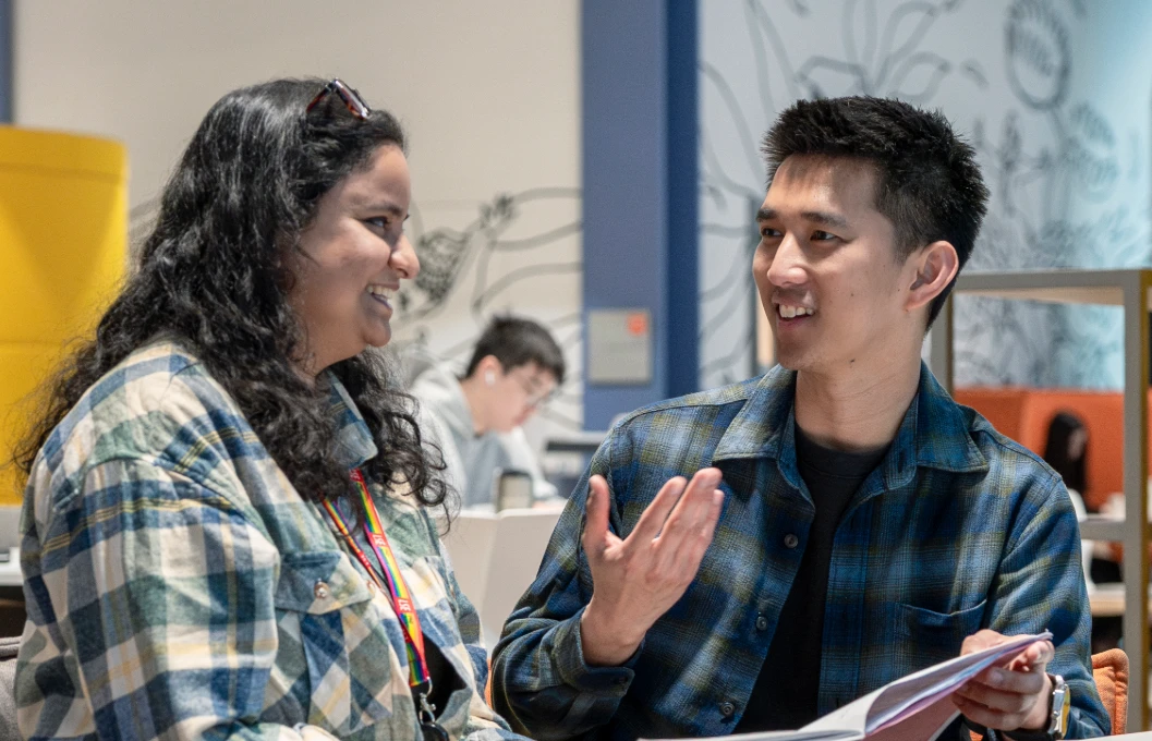 Two PBS students talking in the Centre Building