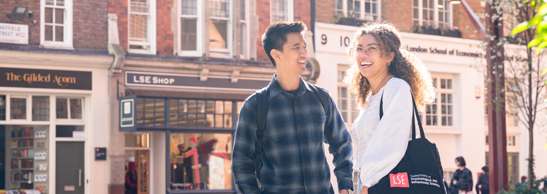 Two PBS students talking on campus