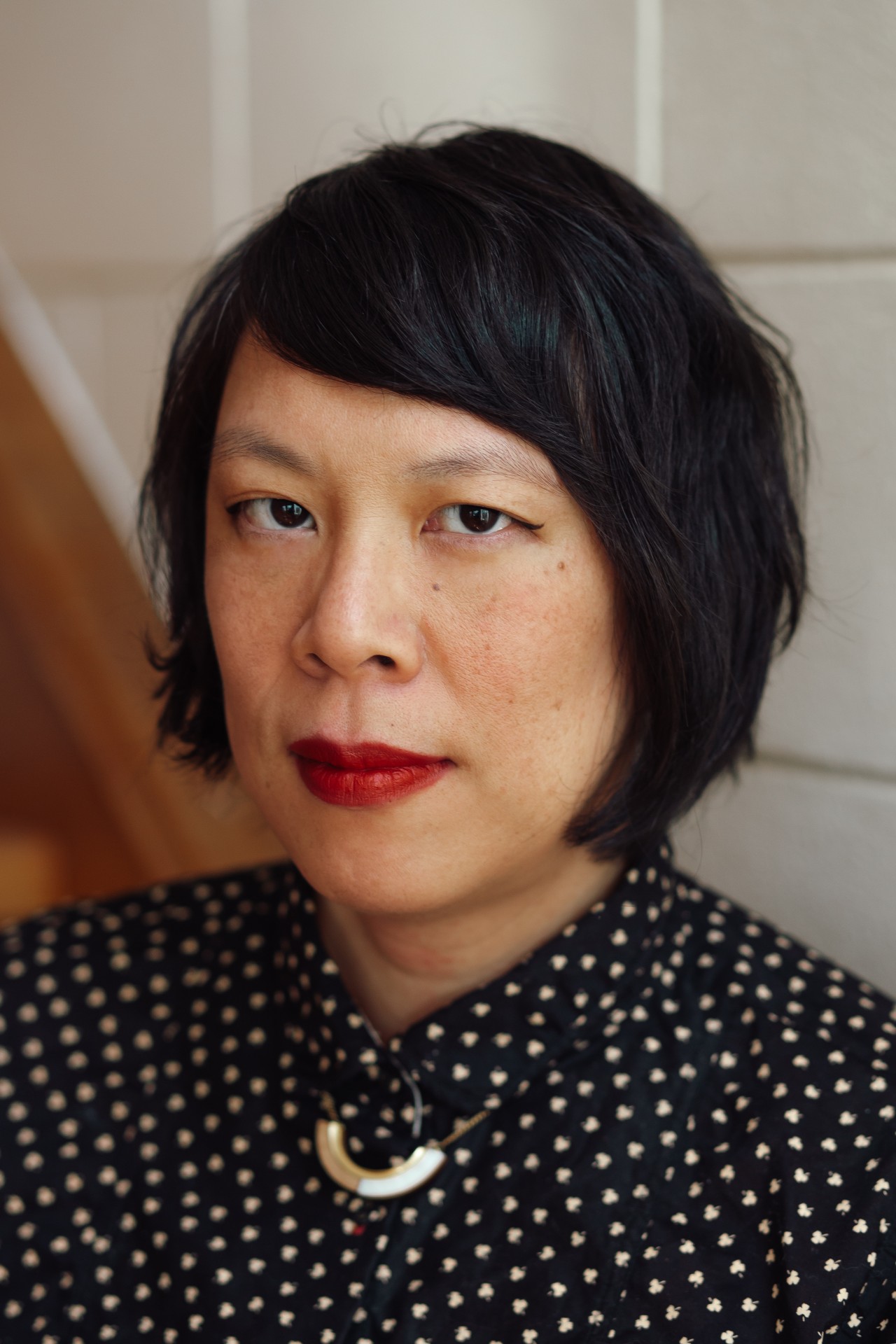 headshot of Tze Ming Mok looking at the camera