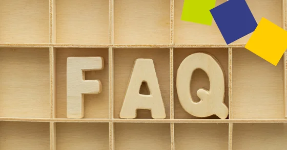 The letters 'FAQ' are displayed on a shelf