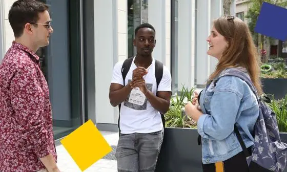 LSE students talk in the courtyard