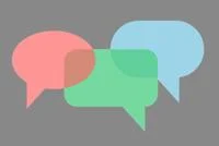 Pink green and blue speech bubbles on grey background. iStock. Department of International Relations only