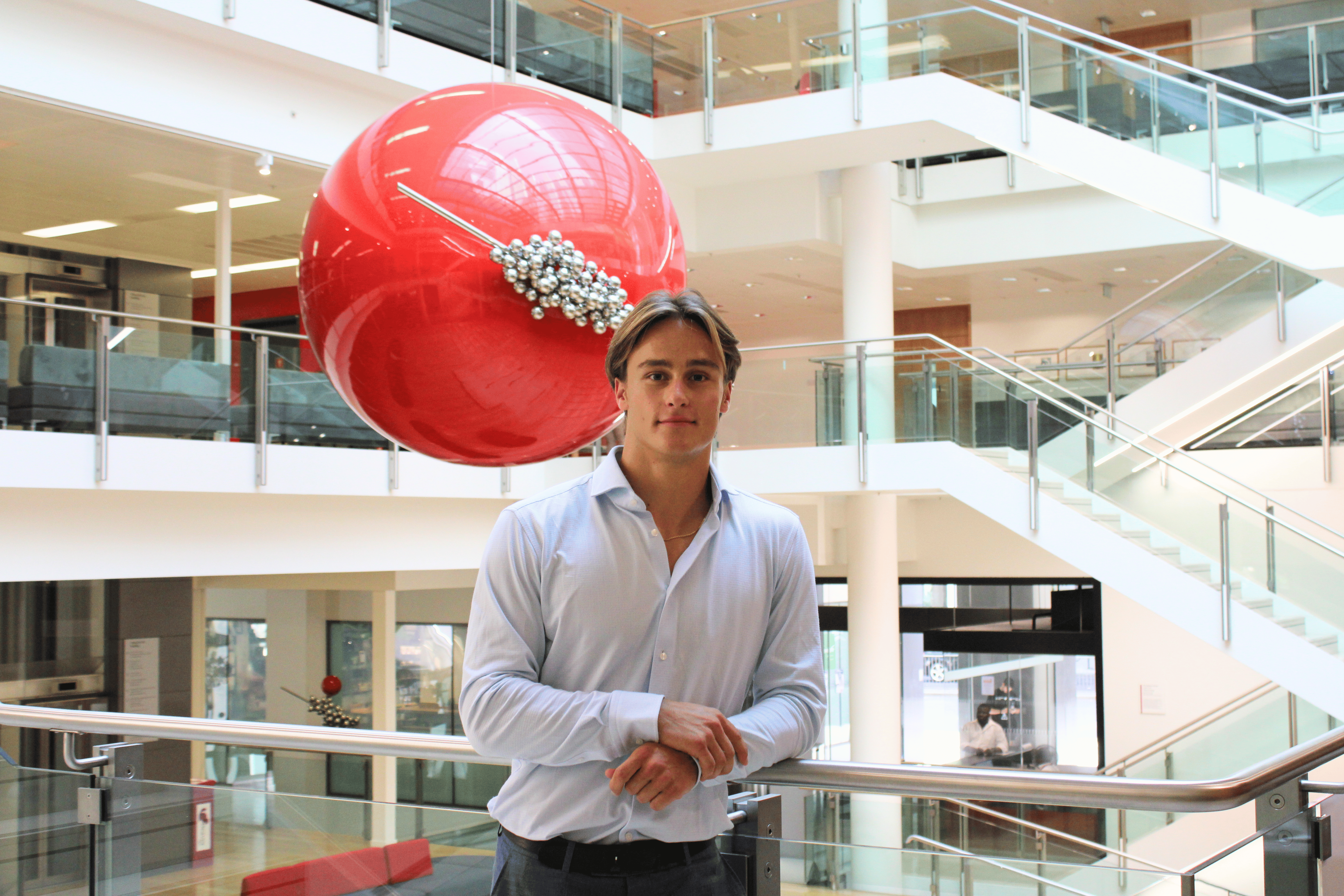 Flavio standing inside LSE’s Cheng Kin Ku Building