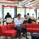 Flavio studying on a laptop in LSE’s Centre Building