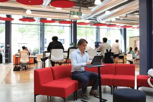 Flavio studying on a laptop in LSE’s Centre Building