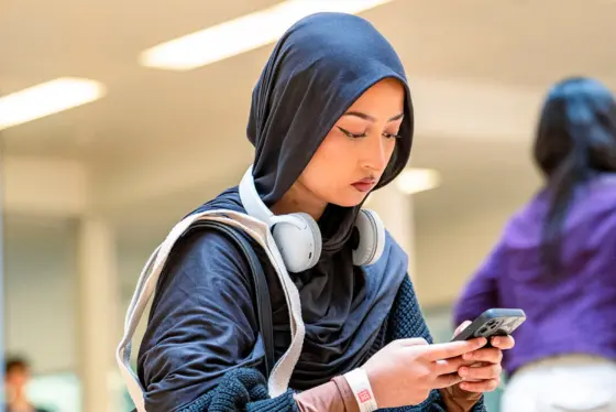 Student looking at their phone