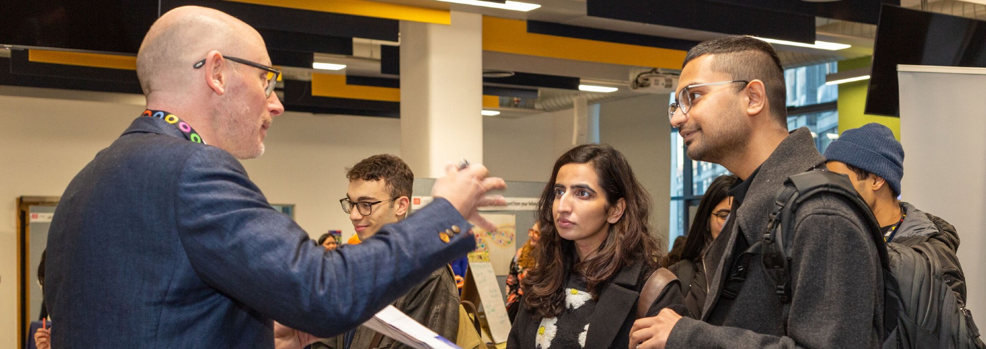 Students at reWelcome getting advice at helpdesk