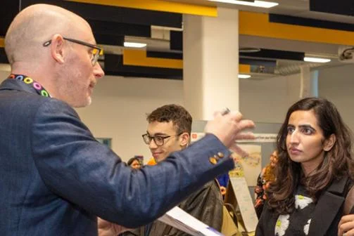 Students at reWelcome getting advice at helpdesk