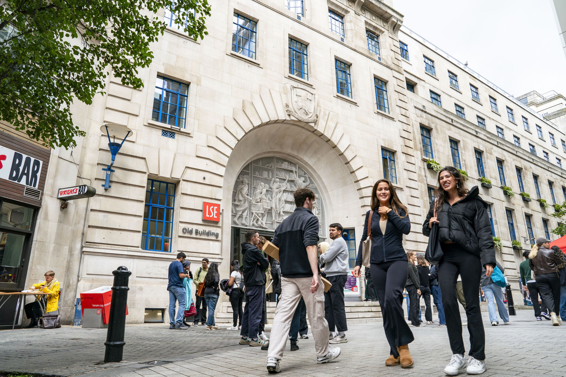 Students outside LSE Old Building on campus