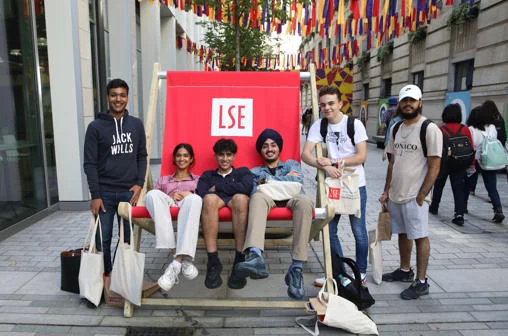 students sitting in a giant deckchair