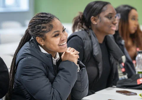 An LSE Thrive participant smiling in a campus visit session