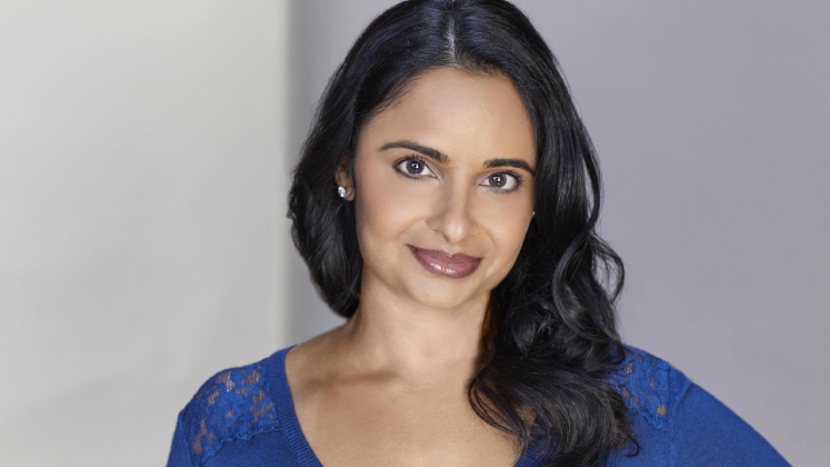 Profile image of Mansi Shah showing her wearing a blue top against a white background