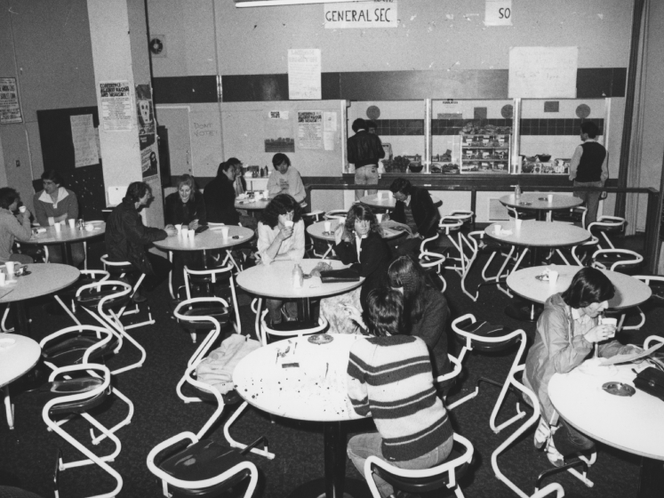Black and white image showing LSE students sitting in Florrie's coffee bar