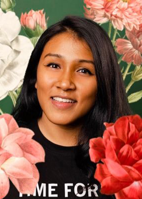 Profile image of Nina Mohanty showing her against a green background and surrounded by flowers