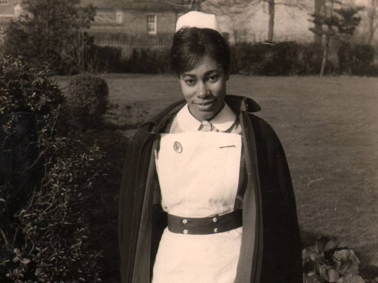 Black and white photo of Dawn Hill wearing her nurse uniform in the 1960s