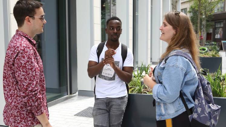 LSE students talk to each other on Houghton Street