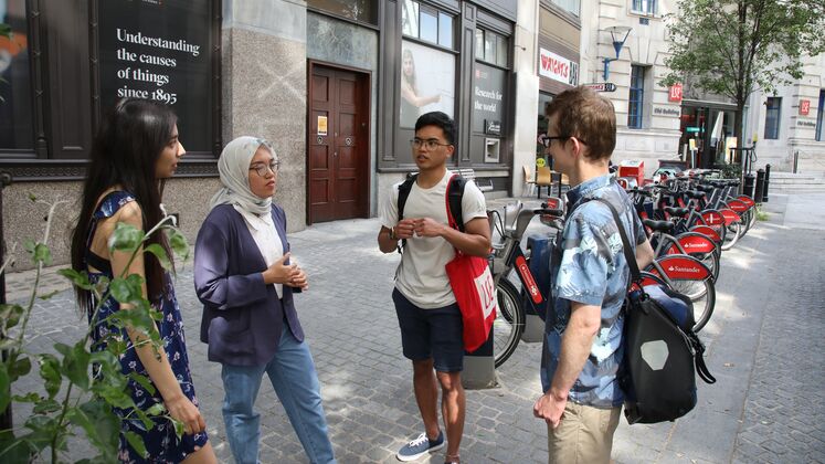 Students outside old building