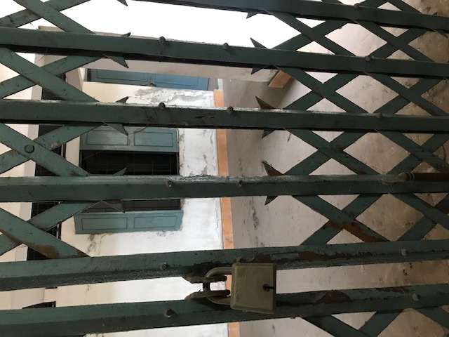 KG metal gate padlocked