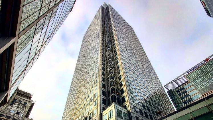 Canary Wharf's tower as seen looking up from street level.