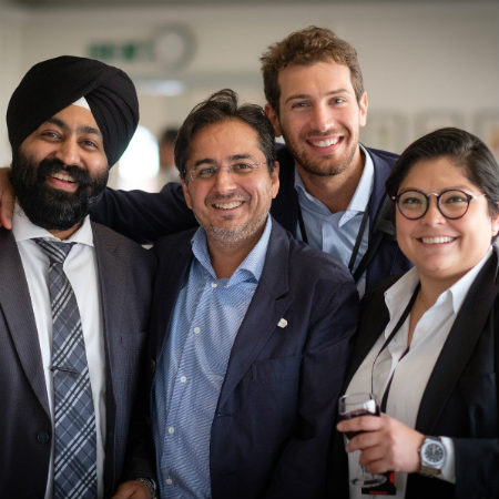 A group of professionals smiling.