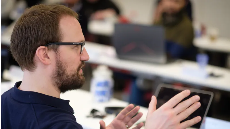 A man having a discussion in a classroom Entrepreneurship and Innovation in the Age of Change