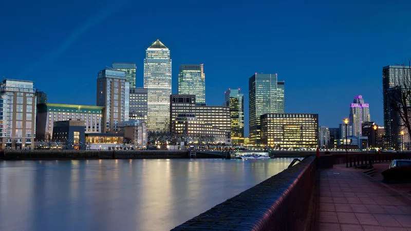 City skyline at night Real Estate Economics and Finance