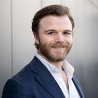 Head and shoulders portrait of Robert Rogers, PhD candidate in the Department of Finance