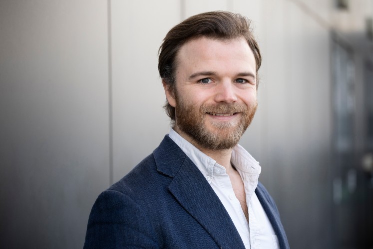 Head and shoulders portrait of Robert Rogers, PhD candidate in the Department of Finance