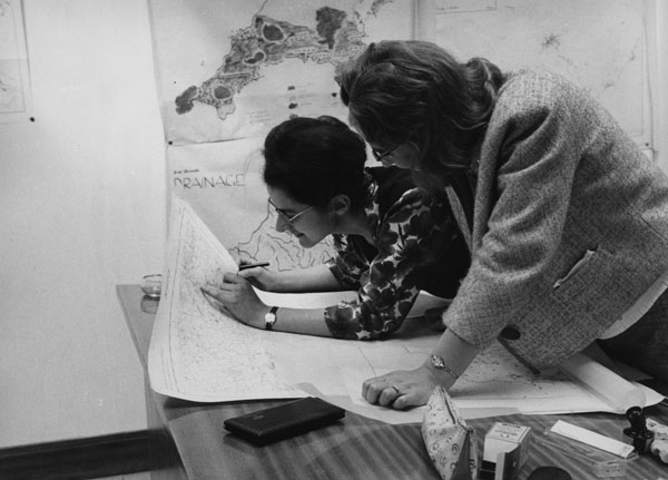 students studying maps