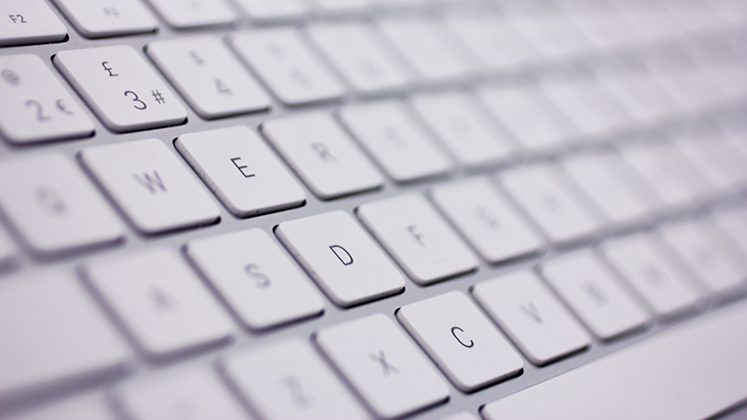 A close-up photograph of a computer keyboard