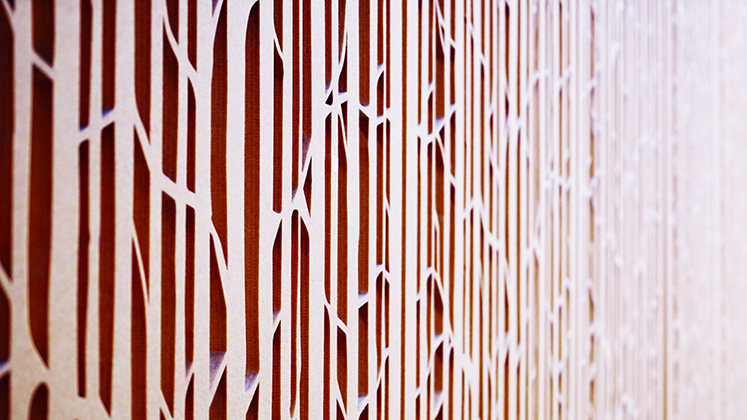 Abstract photo of modern carved wooden screens in the LSE library
