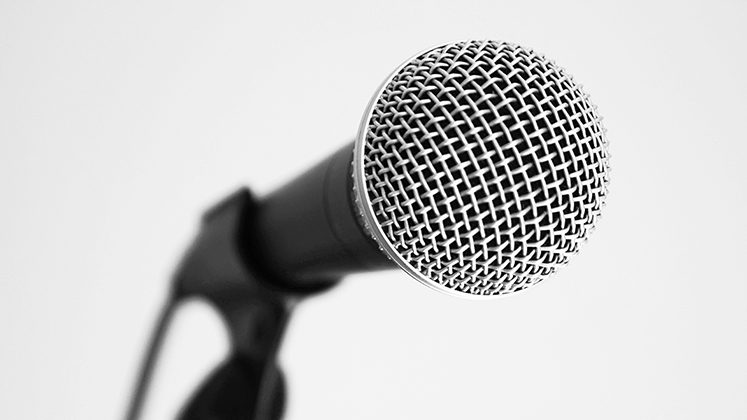 closeup black and white photo of a microphone