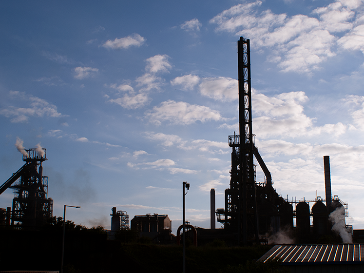 Port Talbot Steel Works in South Wales silhouetted in the evening sun.
