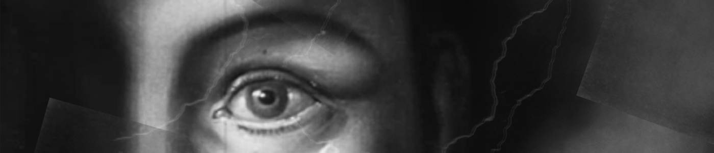 Close up black and white image of a woman's left eye.