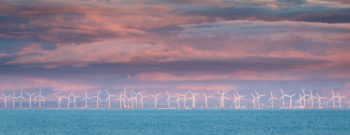 Wind Farm in motion at Sunset in the Solway Firth